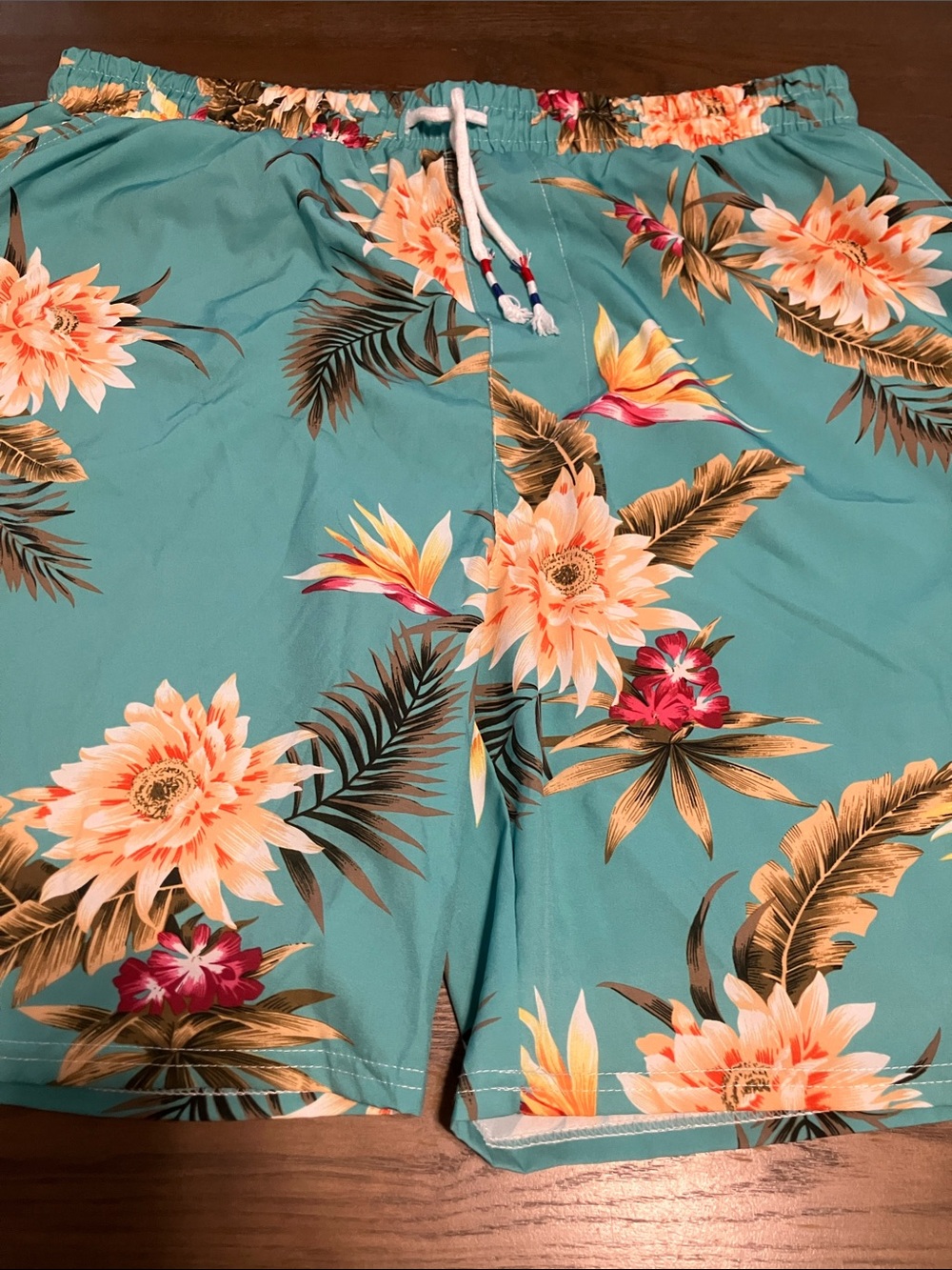 Turquoise Floral Swim Shorts with Peach & Yellow Blooms